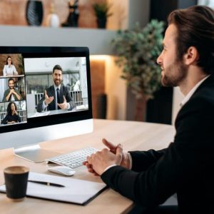video-conference-with-business-partners-successful-business-caucasian-man-sits-in-his-modern-office-1024x681
